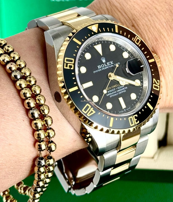 Sea-Dweller 43mm Steel Gold Box and Papers