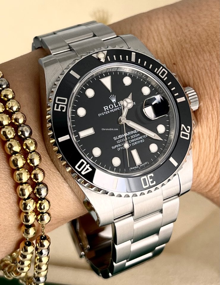Submariner Date, wie neu, Box und Papiere