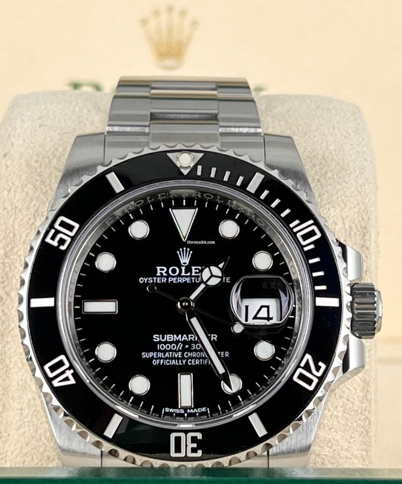 Submariner Date, wie neu, Box und Papiere
