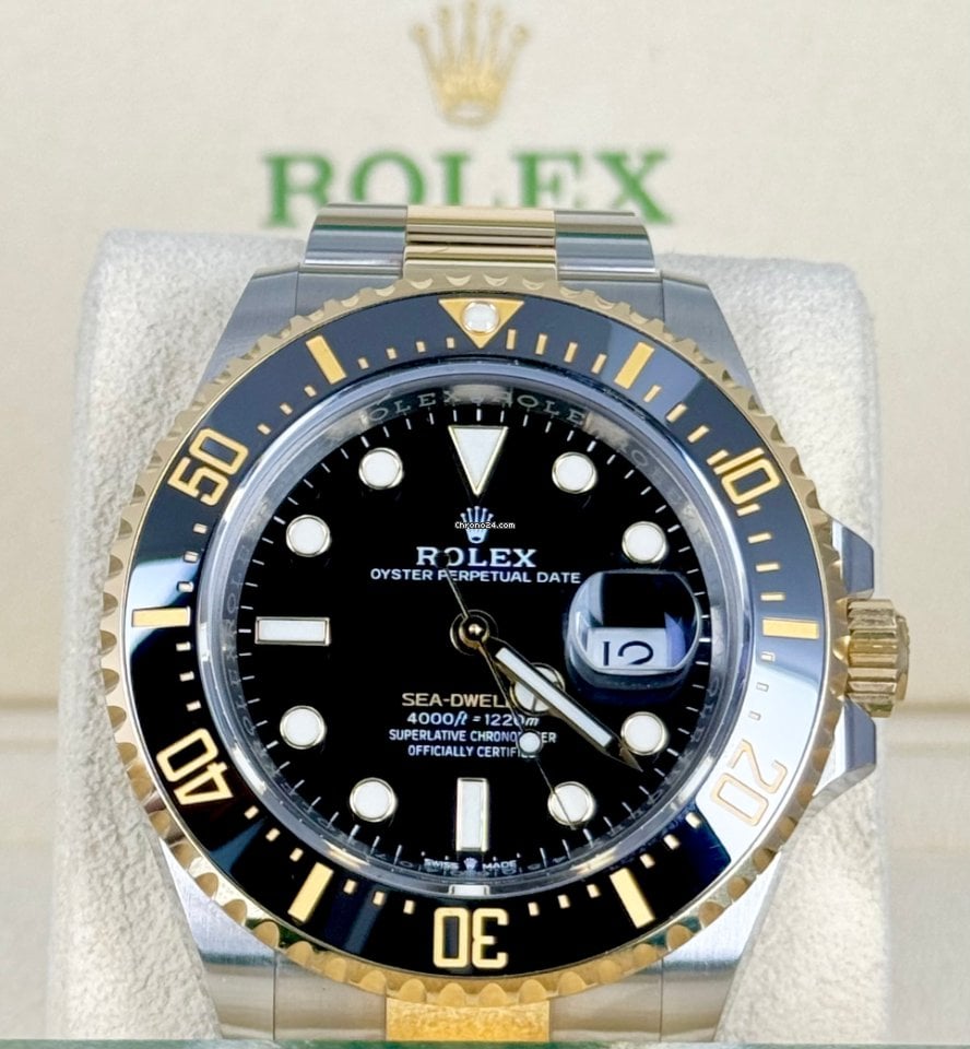 Sea-Dweller 43 mm Stahl Gold, Box und Papiere