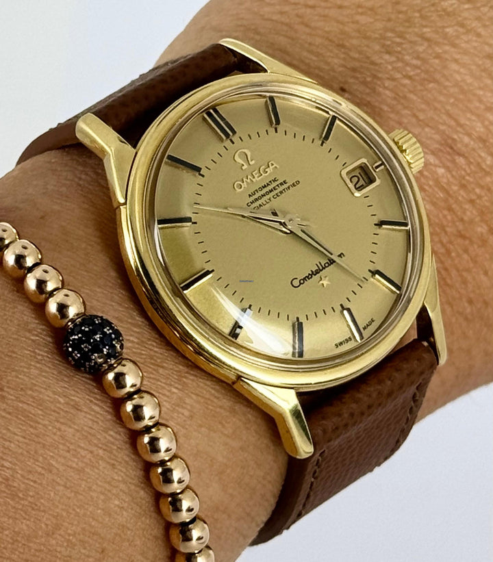 Omega Constellation caliber 561 34 mm 18k Gold.