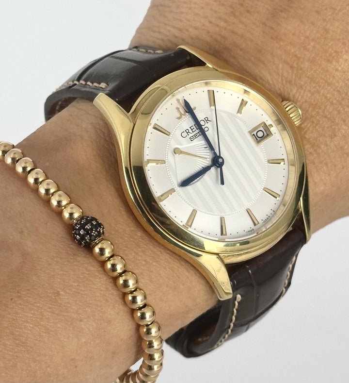 Grand Seiko Credor Spring Drive Movement Very rare with papers 18k Massive Gold with instrucions Book Hybrid 38.5 mm