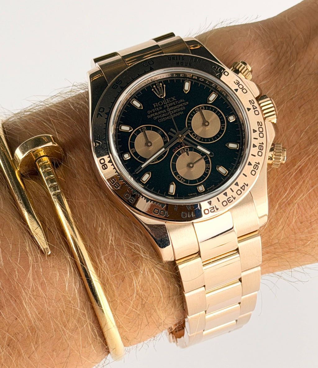 Rolex Daytona, 18 Karat Roségold, schwarzes Zifferblatt, neuwertig