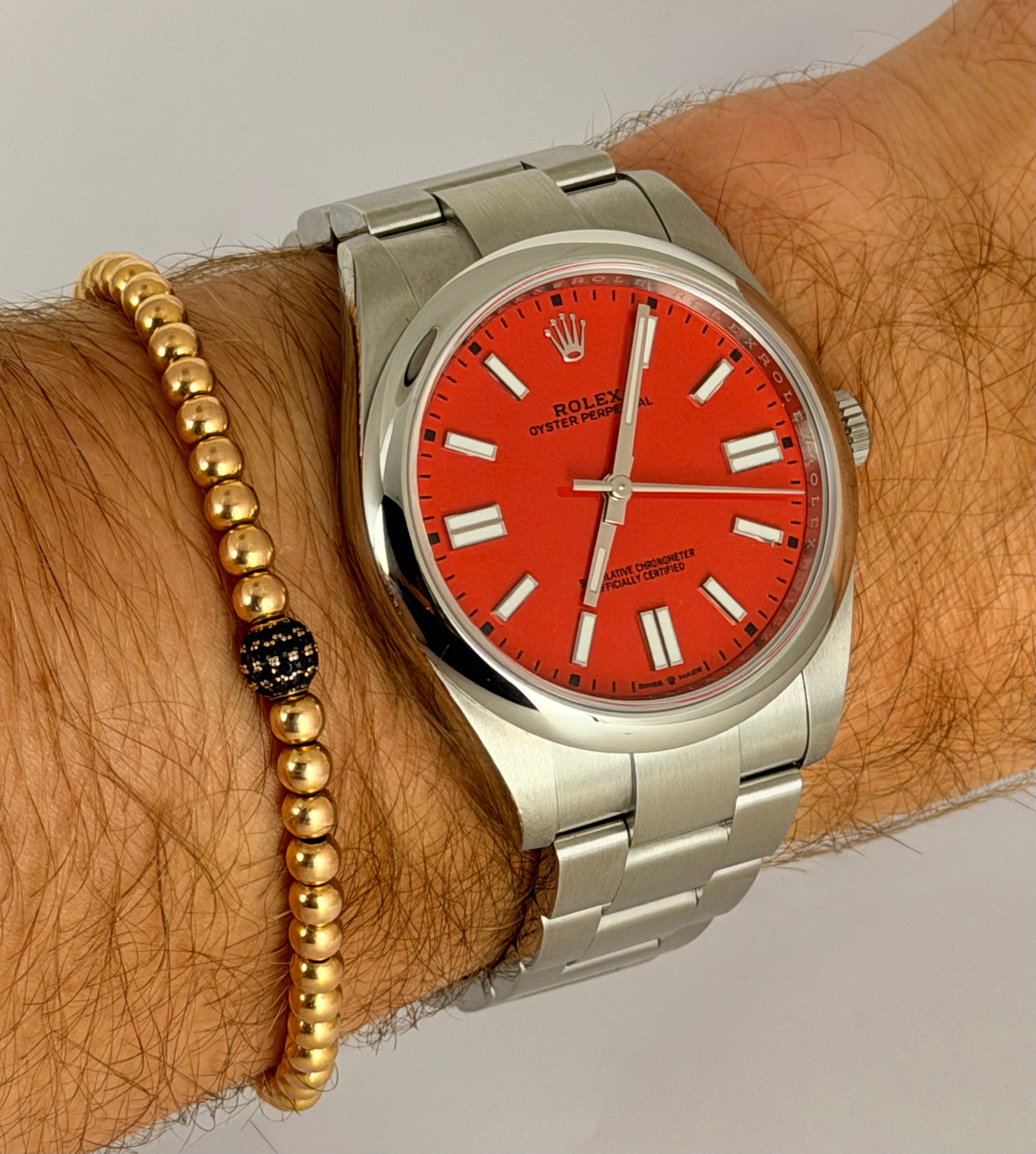 Rolex Oyster Perpetual 41, korallenrotes Zifferblatt, 99 % neu, unpoliert, Box & Papiere