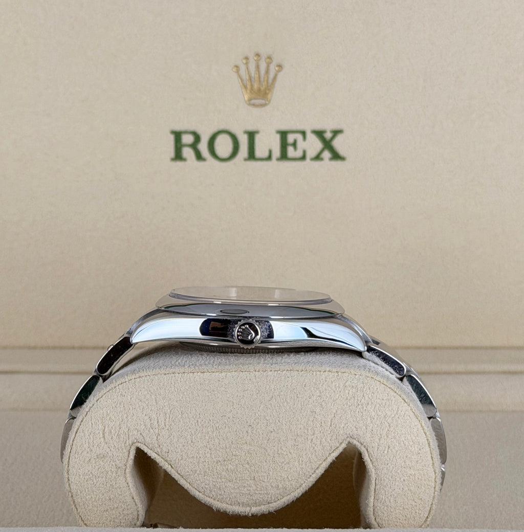 Rolex Oyster Perpetual 41, korallenrotes Zifferblatt, 99 % neu, unpoliert, Box & Papiere