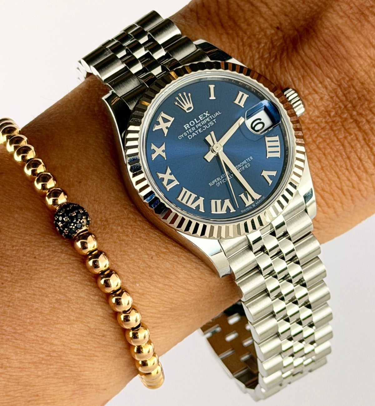 Rolex Datejust 31 mm mit 18-karätiger Weißgoldlünette, 2025, Full Set, wie neu