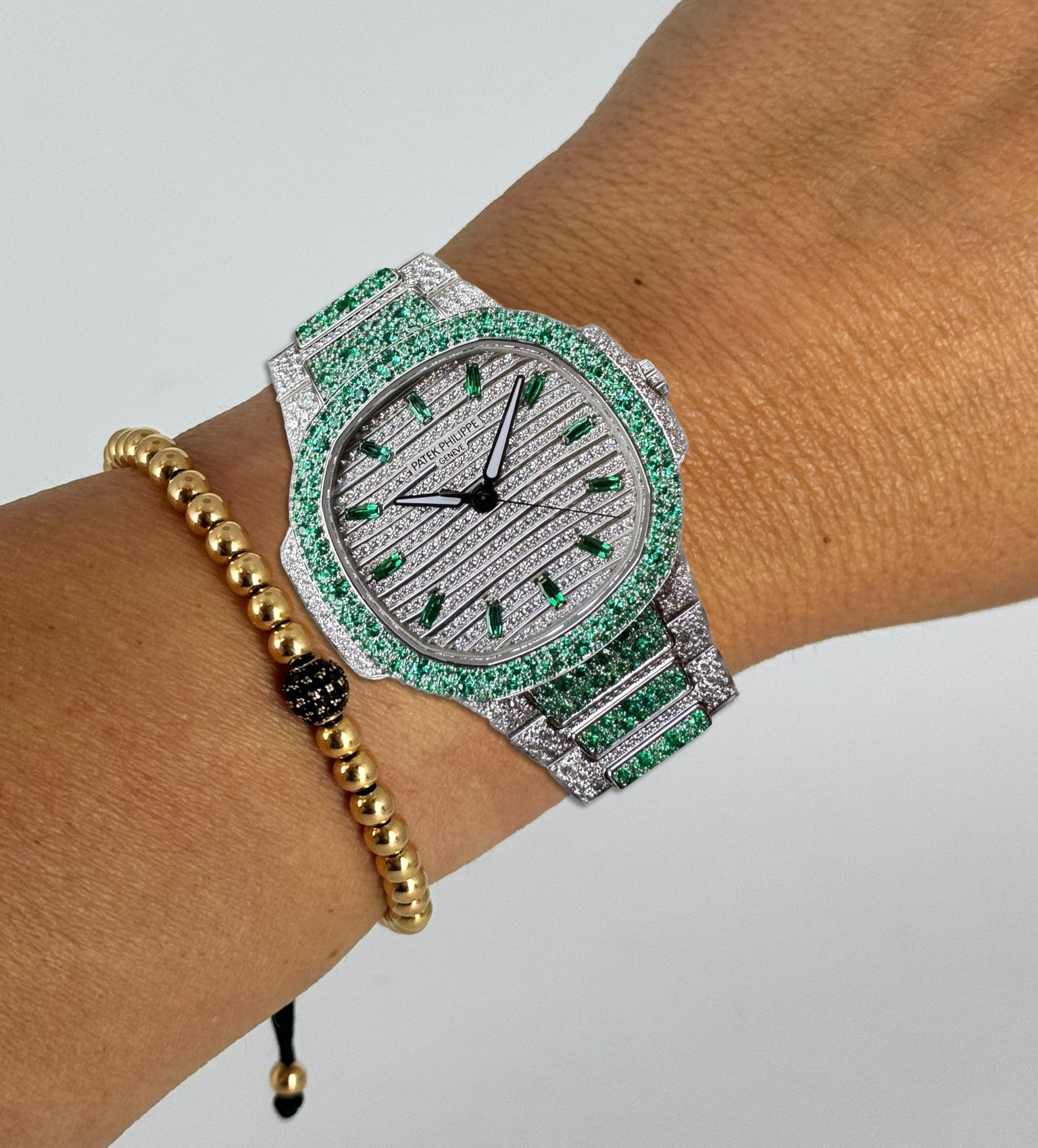 Nautilus Haute Joaillerie mit grünen Edelsteinen und vollständigem Diamantbesatz