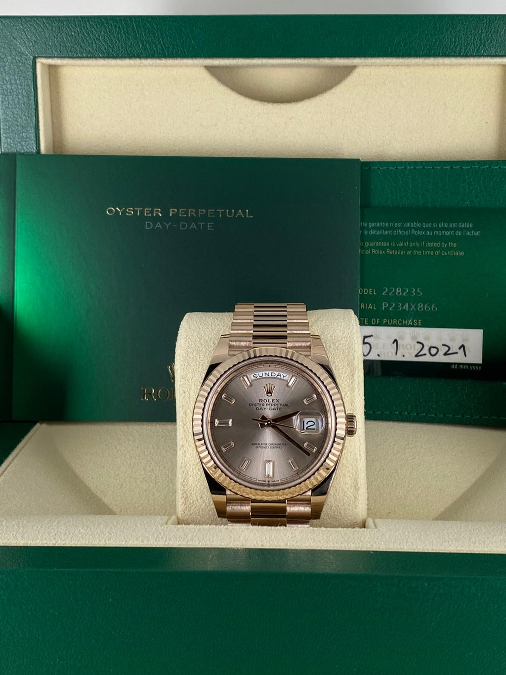 Rolex Day-Date Everose Gold mit Baguette-Diamanten