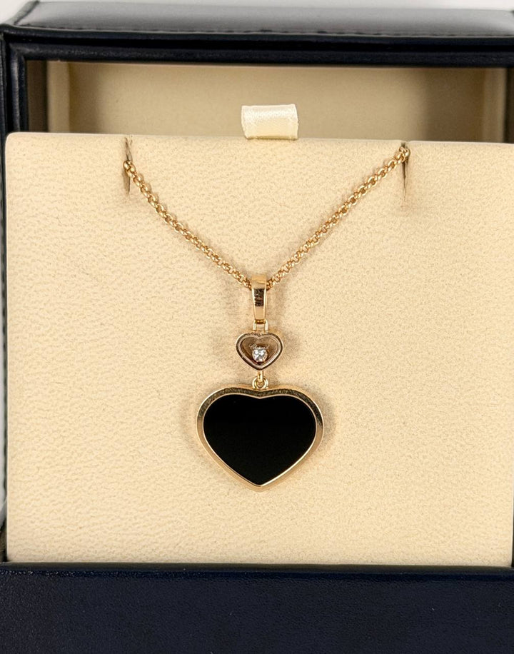 CHOPARD ROSE GOLD NECKLACE WITH ONYX AND A DIAMOND HAPPY HEARTS
