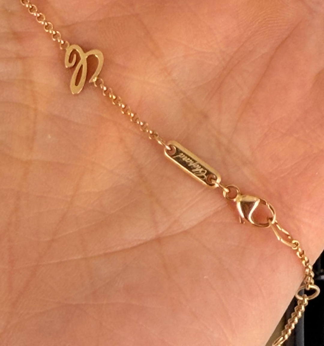 CHOPARD ROSE GOLD NECKLACE WITH ONYX AND A DIAMOND HAPPY HEARTS