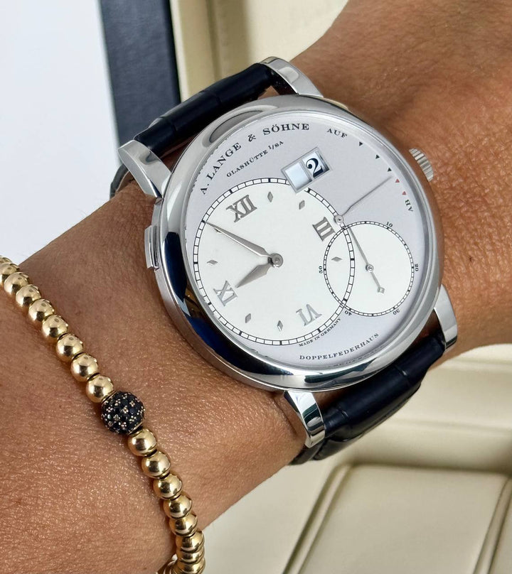 A. Lange & Sohne with box and papers